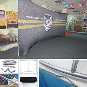 Curved fabric tension display